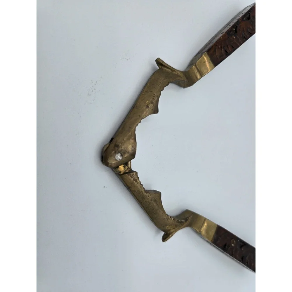 Vintage Wooden and Brass‎ Nutcracker with Hand-Carved Floral Design
